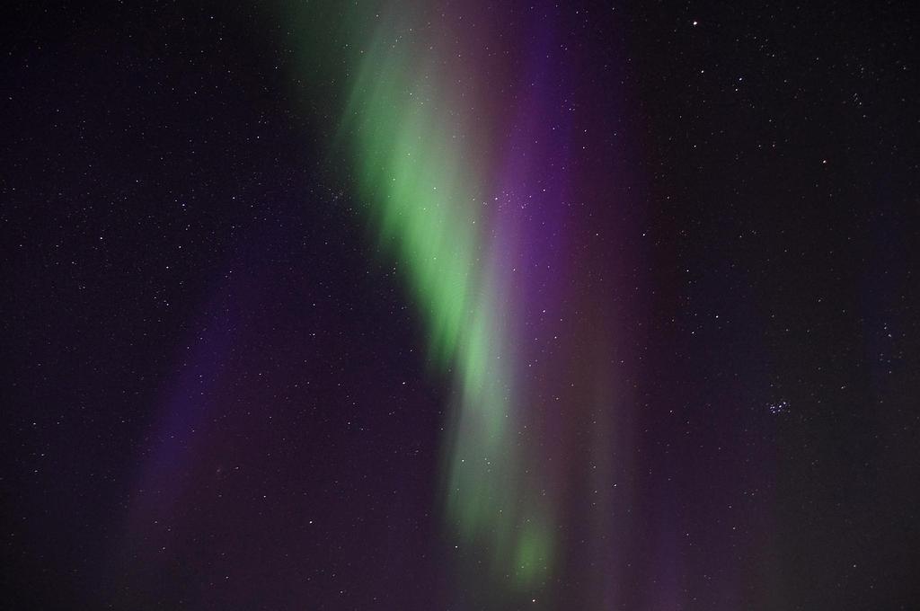 Northern lights dancing over Icelandic glaciers